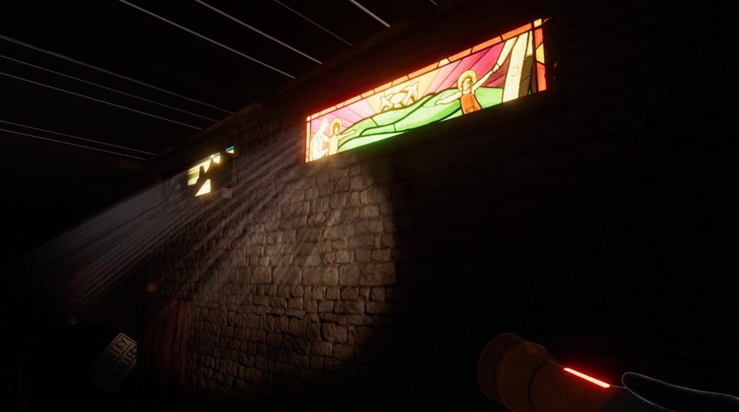  In-game screenshot focusing on a stained glass window through which beams of light stream, assumedly from a car outside. Perspective is limited by the reach of the torchlight, so little beyond the window is discernible, but the exterior light source illuminates the design of the stained glass. Pictured are two small children, one on either end of the long, landscape window. They are being kept apart, despite outstretched arms, by two adult figures in white medical coats. Between them is a grassy, hilly area. Sun beams stream down onto the two adult figures. 