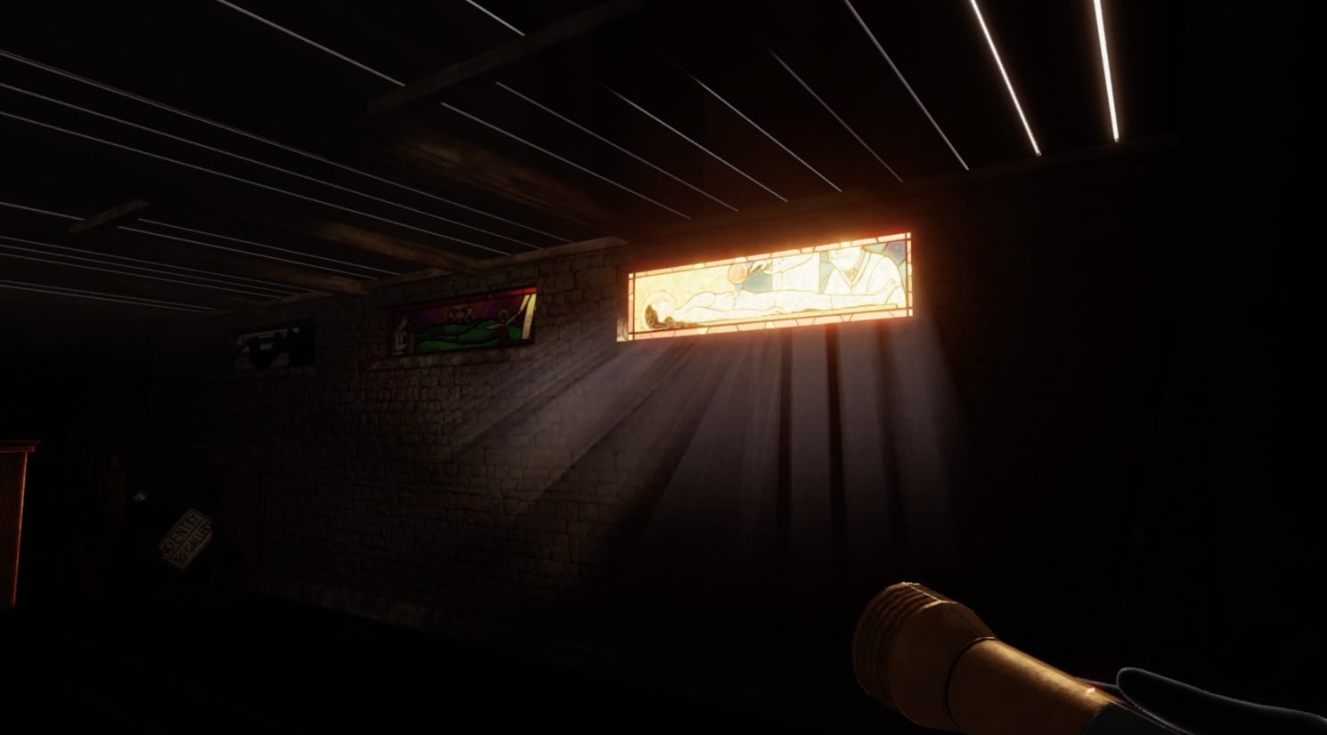  In-game screenshot focusing on a stained glass window through which beams of light stream, assumedly from a car outside. Perspective is limited by the reach of the torchlight, so little beyond the window is discernible, but the exterior light source illuminates the design of the stained glass. A naked female figure lies flat on an operating table while a second figure, clad in surgical attire, appears to operate on her.